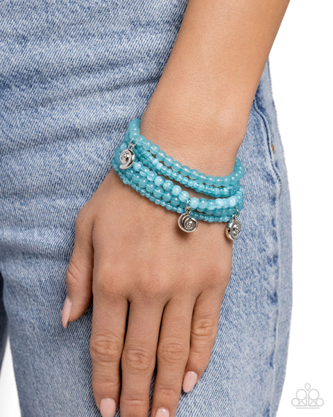 Swirling Shopaholic Blue Bracelet